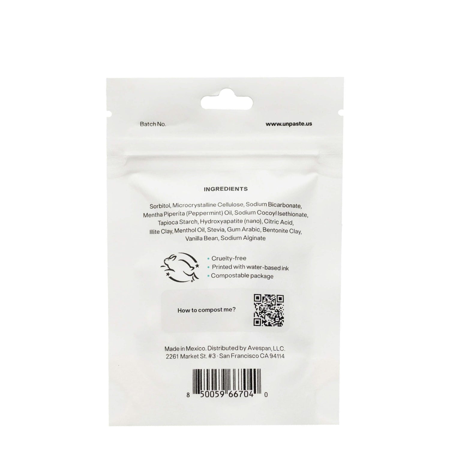 The back of an unpaste toothpaste tablet white bag with and ingredients list.