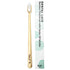 A bamboo toothbrush with soft bristles next to its white packaging box, which features green swirl patterns and the text &