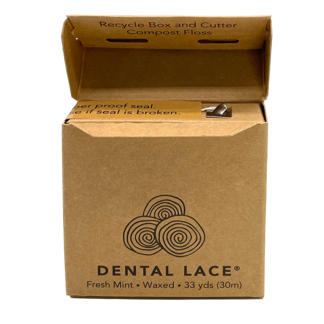 A brown cardboard box for Dental Lace compost floss, shown open against a white background. The box features the brand logo and text indicating &
