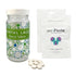 Glass Dental Lace bottle with two white Fluoride Unpaste Toothpaste Tablets packages. 