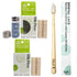 Dental care product set on a white background: a bamboo toothbrush with castor oil bristles, a box of Silk Floss thread, a small bottle of refillable dental lace, and a vertical box labeled Bamboo Toothbrush with Castor Oil bristles.